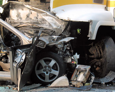 Our Tampa Truck Accident Lawyers are experienced in handling large truck accidents involving negligence and injuries in the Tampa Bay Area of Florida such as this large truck head-on collision with an automobile.