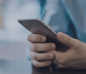 person using a phone for social media