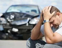 Negligence Resulting in Auto Accidents often leads to remorse by guilty drivers, such as the one suffering in this photo.
