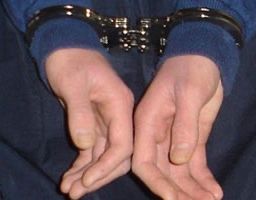 Defendant in Handcuffs
